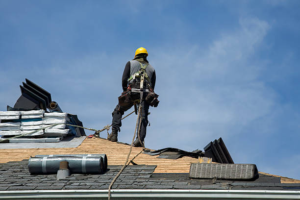 Professional Flat Roof Repair technician working in Camden, MO